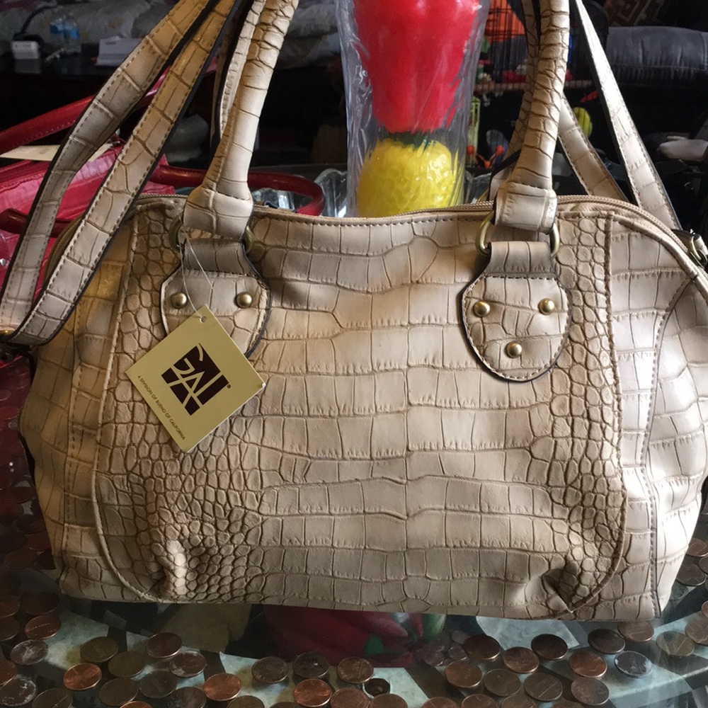Tan hand bag